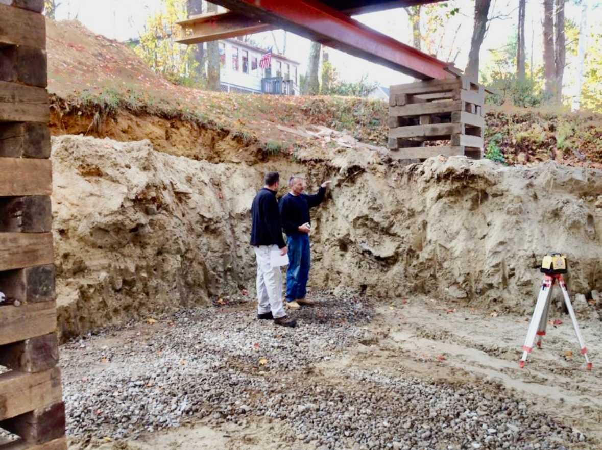 Two Men At Under Construction House